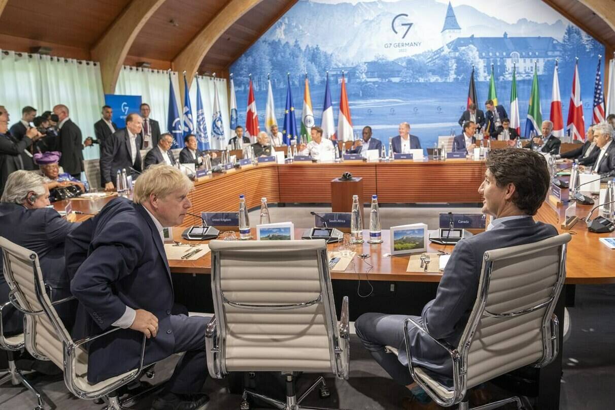 Prime Minister Justin Trudeau and British Prime Minister Boris Johnson chat prior to a meeting with Partner Countries and International Organizations at the G7 Summit in Schloss Elmau on Monday, June 27, 2022. The Canadian prime minister and his G7 counterparts are expected to end their summit in Germany with a show of support for Ukraine on before all seven leaders will head to a NATO summit in Spain. THE CANADIAN PRESS/Paul Chiasson