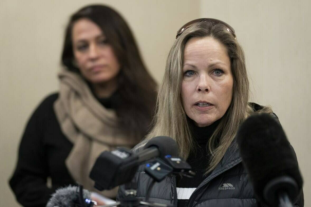 Tamara Lich, organizer for a protest convoy by truckers and supporters demanding an end to COVID-19 vaccine mandates, delivers a statement during a news conference in Ottawa, Thursday, Feb. 3, 2022. A lawyer for “Freedom Convoy” organizer Tamara Lich says the Alberta woman has been arrested over what appears to be a matter related to her bail conditions. THE CANADIAN PRESS/Adrian Wyld