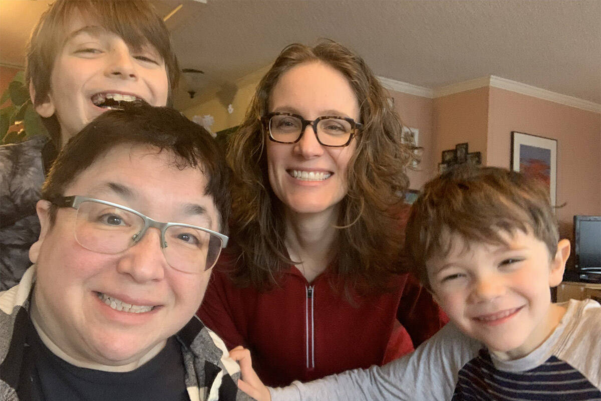 Eva Moore (center), an openly queer pediatrician, is pictured with her wife, Hope Forstenzer (bottom left), and their two children. (Photo: Eva Moore).