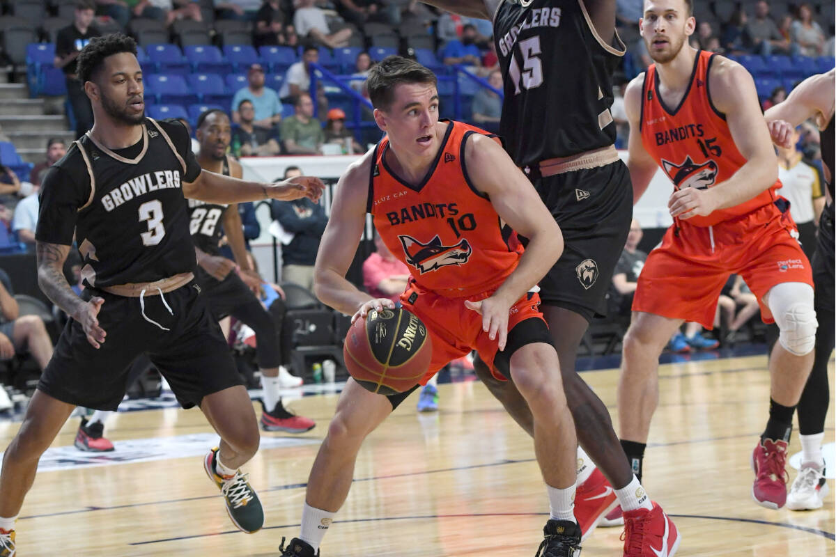 Langley’s own Ty Rowell (centre) and Surrey’s James Karnik (right) are both playing with the Fraser Valley Bandits, who are back on home court tonight (Friday, July 1) for a Canada Day game at Langley Events Centre, starting at 7:30 p.m. (CEBL/Special to Langley Advance Times)Langley’s own Ty Rowell (centre) and Surrey’s James Karnik (right) are both playing with the Fraser Valley Bandits, who are back on home court tonight (Friday, July 1) for a Canada Day game at Langley Events Centre, starting at 7:30 p.m. (CEBL/Special to Langley Advance Times)