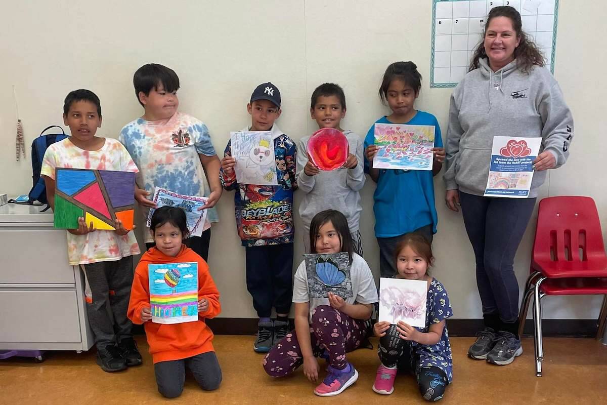 Brenda Lennax (right), a volunteer with BC Airlift Emergency Response Operations, delivered cards and books to students at Stein Valley Nlakapamux School in Lytton, B.C.