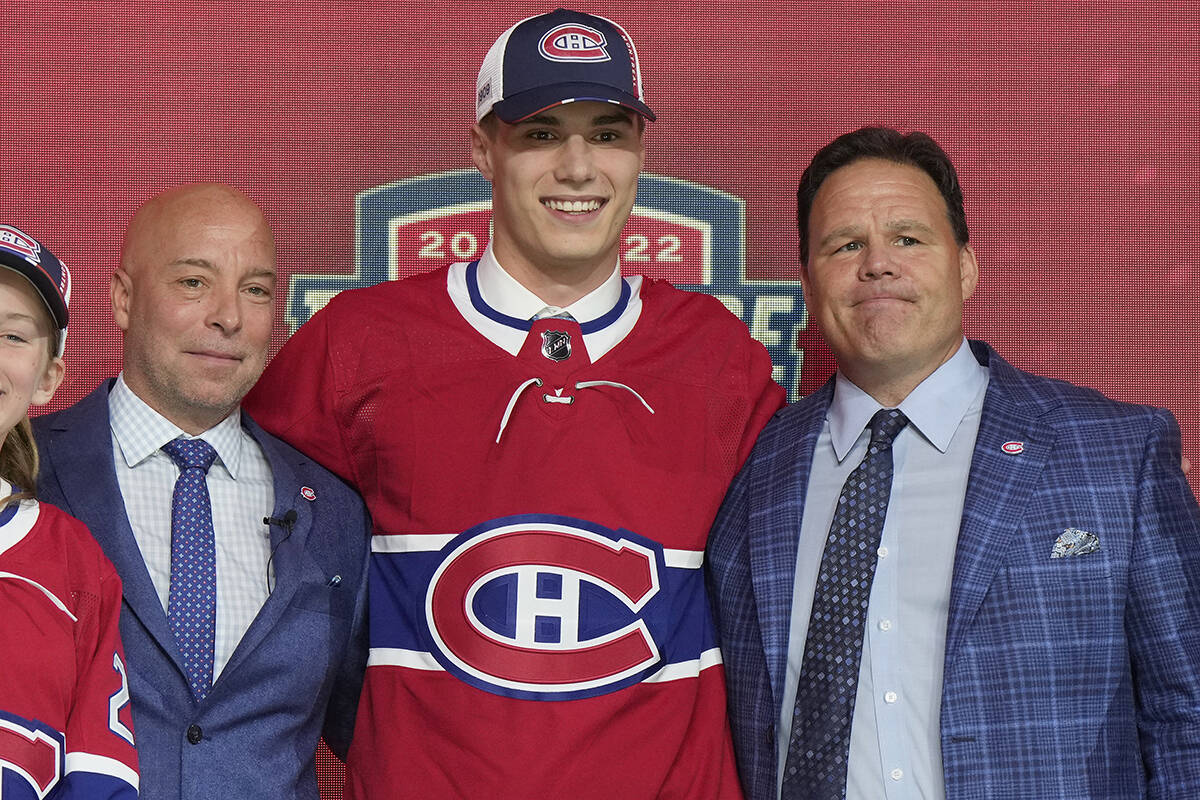 Juraj Slafkovsky poses for photos after being selected as the top pick in the first round of the NHL draft by the Montreal Canadiens in Montreal on Thursday, July 7, 2022. THE CANADIAN PRESS/Ryan Remiorz