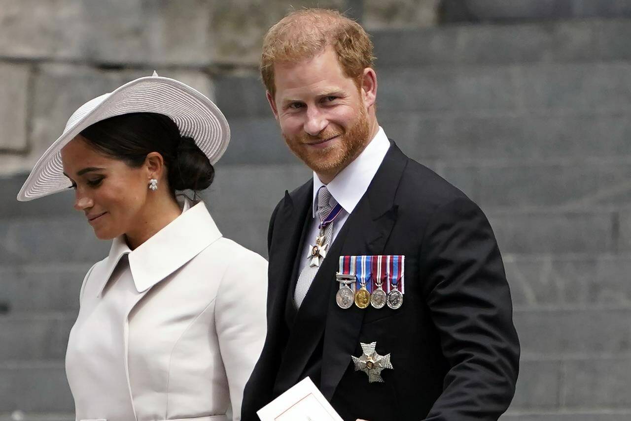 FILE - Prince Harry and his wife Meghan, Duchess of Sussex, depart after attending a service of thanksgiving for the reign of Queen Elizabeth II at St Paul’s Cathedral in London, June 3, 2022. Prince Harry won the first stage of a libel suit against the publisher of Britain’s Mail on Sunday newspaper as a judge ruled Friday, July 8 that parts of a story about his fight for police protection in the U.K. were defamatory. (AP Photo/Alberto Pezzali, file)