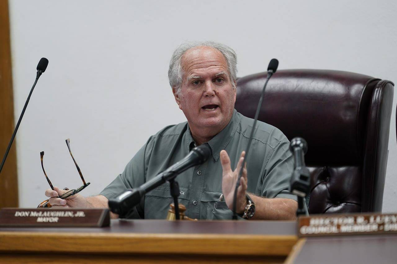 FILE - Uvalde Mayor Don McLaughlin, Jr., speaks during a special emergency city council meeting, June 7, 2022, in Uvalde, Texas. McLaughlin, on Friday, July 8, 2022, disputed a new report alleging missed chances to end the massacre at Robb Elementary School, and possibly stop it from ever happening, again reflecting the lack of definitive answers about the lagging police response to one of the deadliest classroom shootings in U.S. history. (AP Photo/Eric Gay, file)