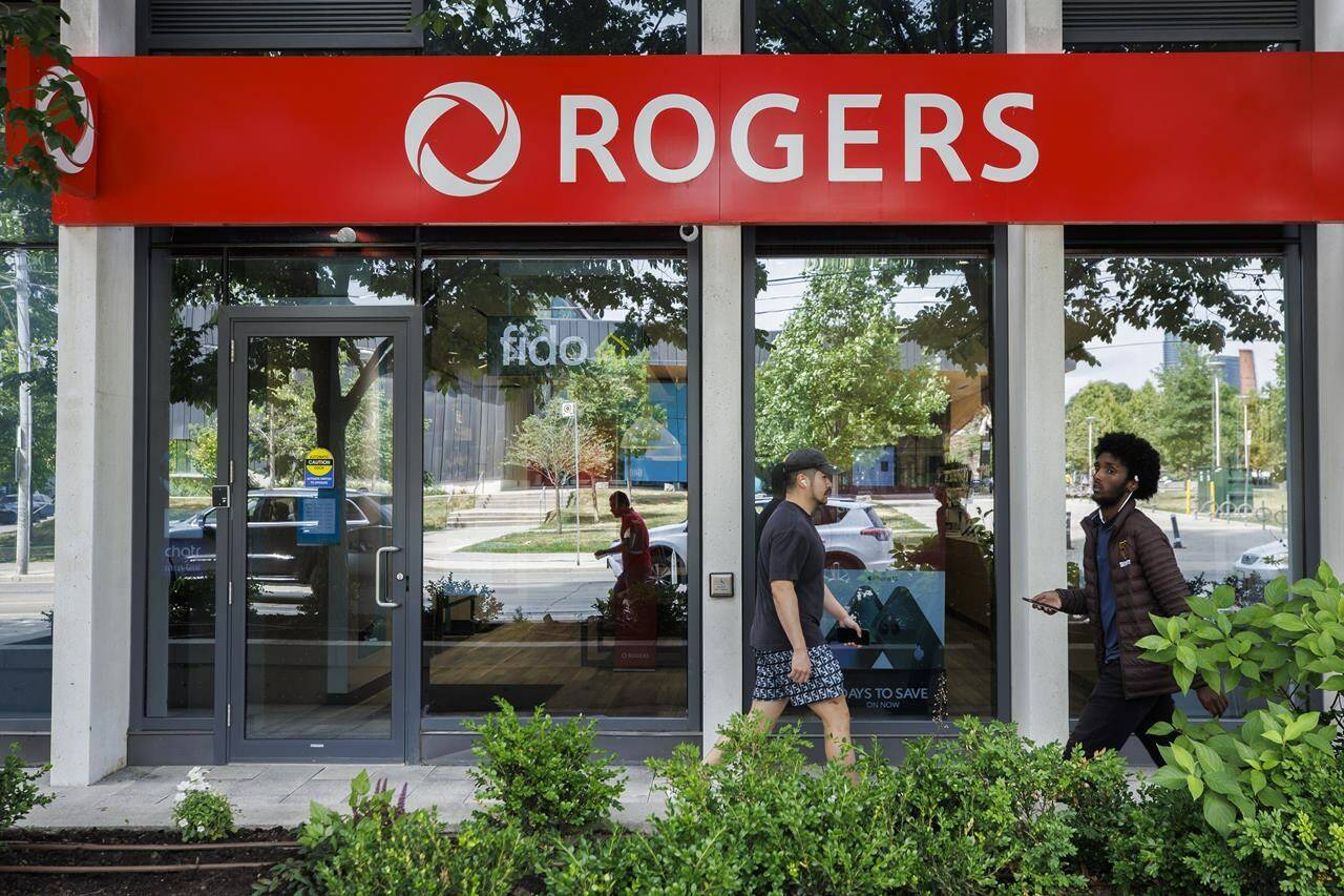 A Rogers wireless store in Toronto amid a country wide outage of the telecommunication company's services, Friday, July 8, 2022. Questions remain as Rogers Communications continues to restore service after a network outage that affected customers across the country. THE CANADIAN PRESS/Cole Burston