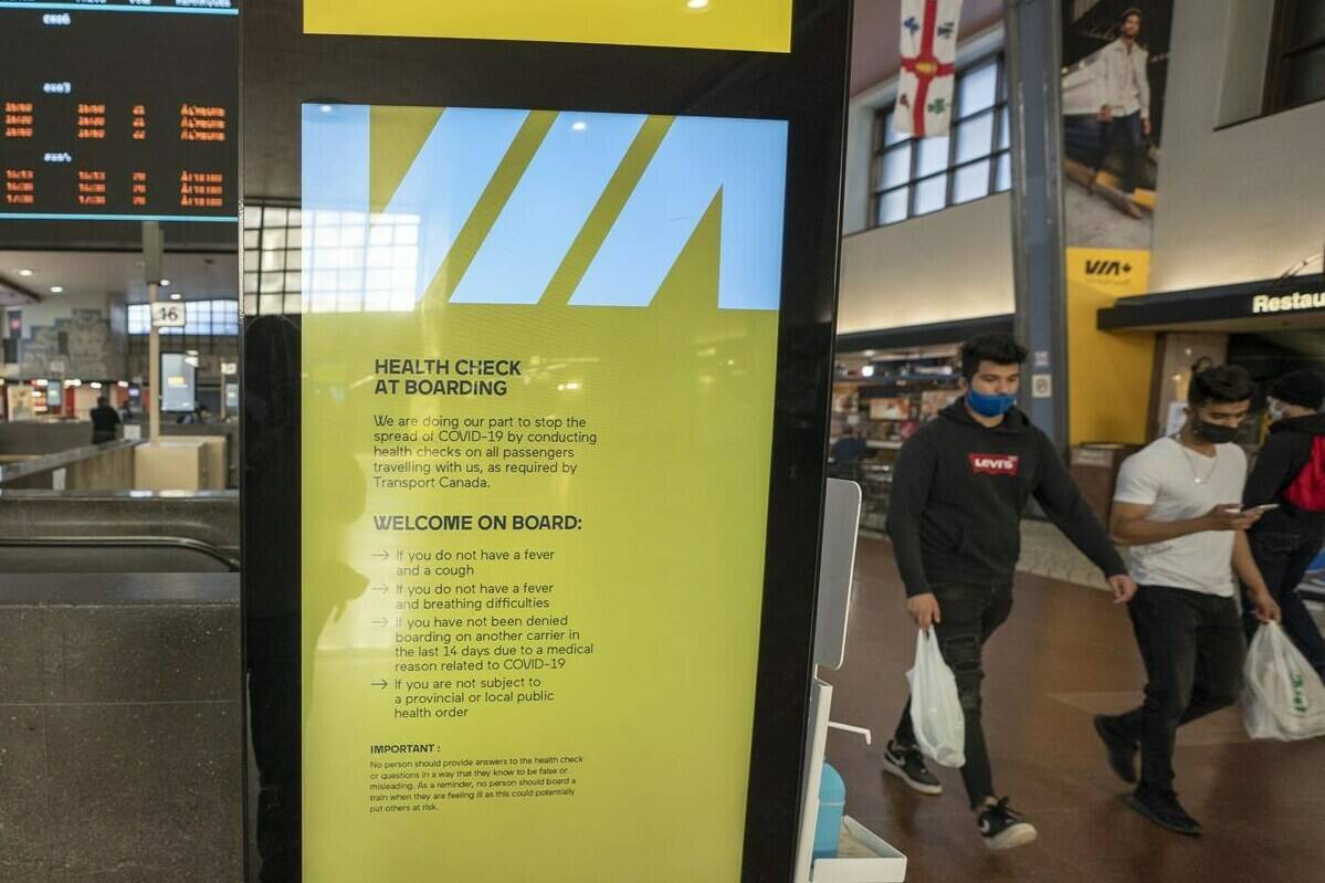 Passengers arrive at a Via Rail kiosk at Central Station in Montreal, Wednesday, Oct. 6, 2021. THE CANADIAN PRESS/Ryan Remiorz