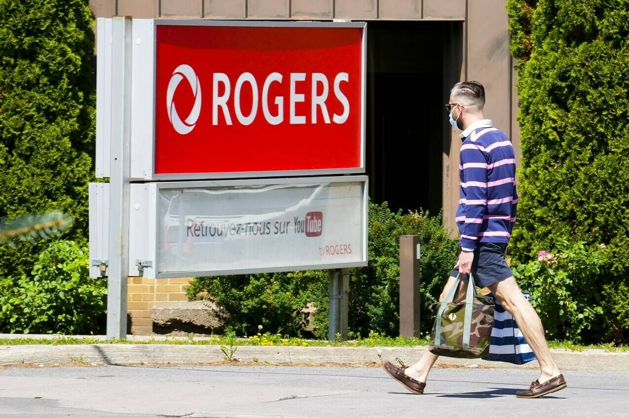 Rogers Communications Inc. will compensate its customers for the massive outage that crippled its network last week by crediting them with the equivalent of five days of service as a first step. Telecommunications company Rogers Communications signage is pictured in Ottawa on Tuesday, July 12, 2022. THE CANADIAN PRESS/Sean Kilpatrick