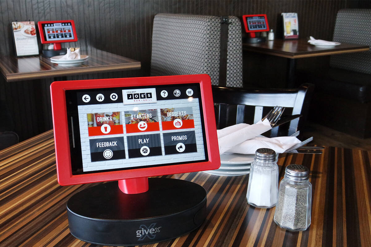Some of Givex’s systems allow customers to order via devices at their table, and COO Graham Campbell says these time-saving tools can allow servers to focus on more important customer interactions. (Photo: Givex).