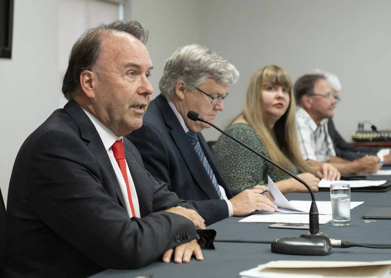 Lawyer Marc Bellemare, left, speaks on behalf of victims at a news conference Thursday, July 14, 2022, in Quebec City. From left, Bellemare, lawyer Alain Arsenault, victims Shirley Christensen, Roger Lessard and Gaetan Begin. Quebec victims of abuse by the Catholic Church are calling on Pope Francis for to deliver “swift justice” to them ahead of his visit to Canada at the end of the month. THE CANADIAN PRESS/Jacques Boissinot