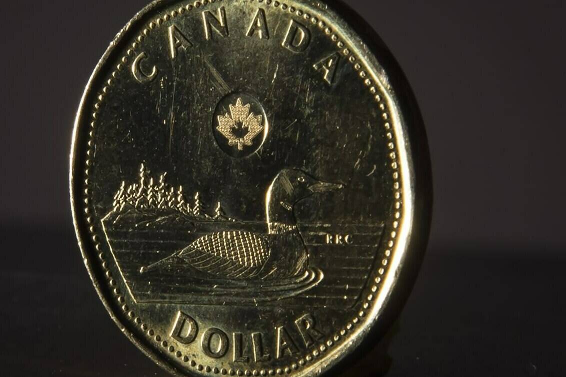 A Canadian dollar coin is pictured in North Vancouver, B.C. Wednesday, May 29, 2019. The loonie hit a 20-month low today, one day after the Bank of Canada announced its largest interest rate hike since 1998. THE CANADIAN PRESS/Jonathan Hayward