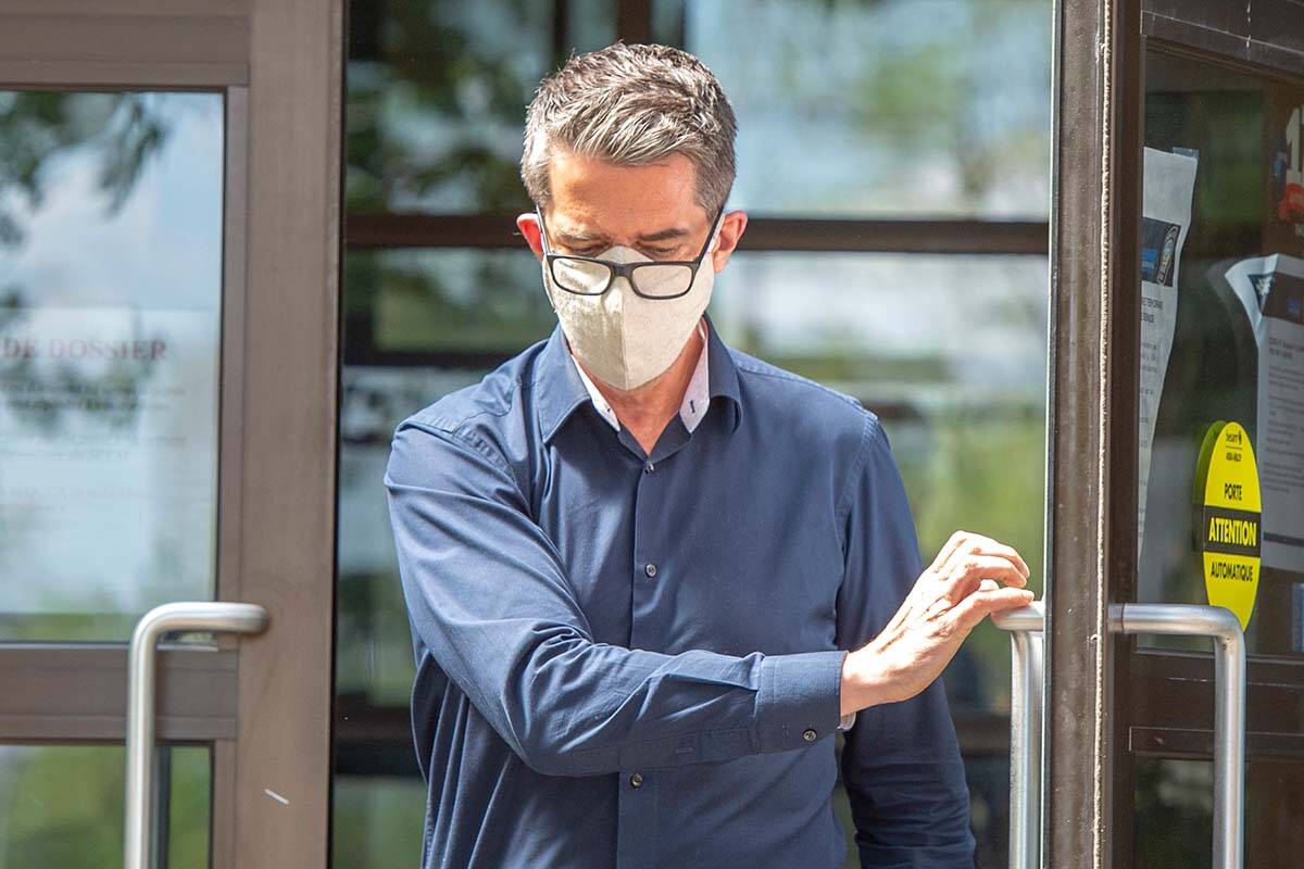 Former Parti Quebecois leader Andre Boisclair leaves the police station on Friday, May 29, 2020 in Montreal. The 54-year-old has since been sentenced to two years in jail for sexually assaulting two young men. (THE CANADIAN PRESS/Ryan Remiorz)