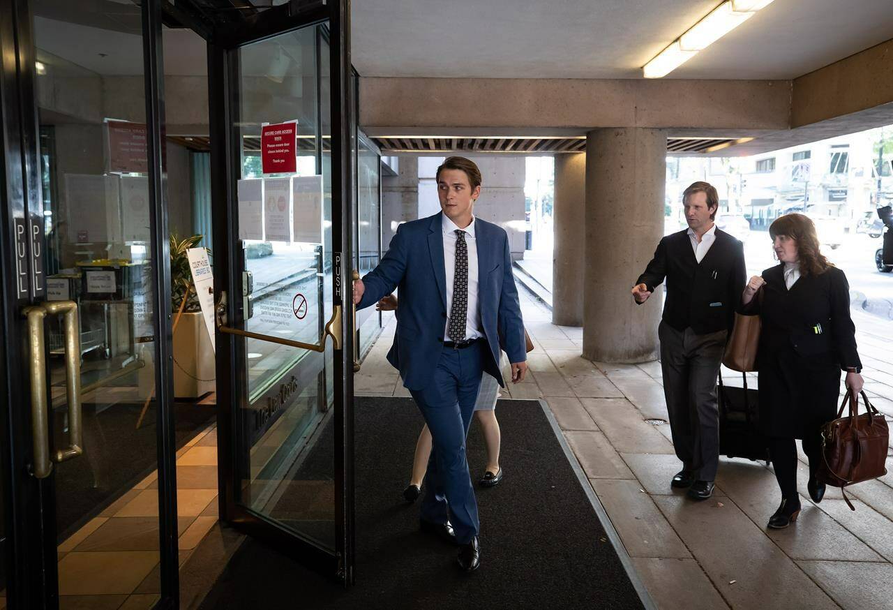Former Vancouver Canucks NHL hockey player Jake Virtanen arrives at B.C. Supreme Court for the third day of his sexual assault trial, in Vancouver, on Wednesday, July 20, 2022. THE CANADIAN PRESS/Darryl Dyck