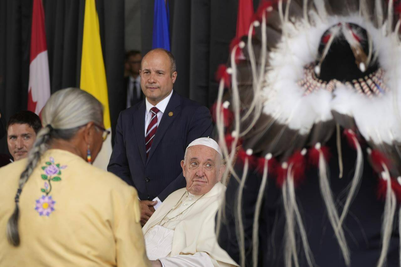 Pope Francis meets the Canadian Indigenous people as he arrives at Edmonton’s International airport, Canada, Sunday, July 24, 2022. Pope Francis begins a weeklong trip to Canada on Sunday to apologize to Indigenous peoples for the abuses committed by Catholic missionaries in the country’s notorious residential schools. (AP Photo/Gregorio Borgia)
