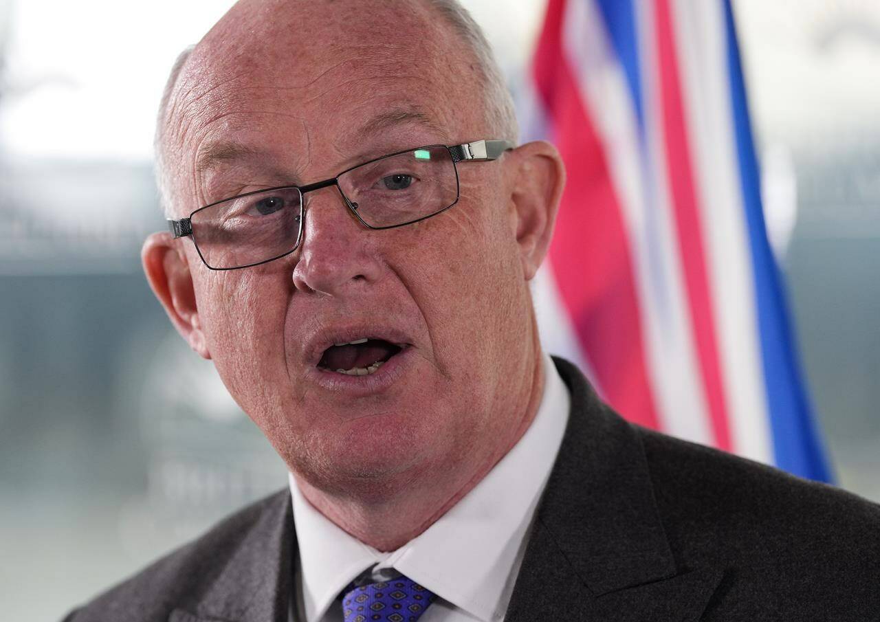 B.C. Public Safety Minister Mike Farnworth speaks during a news conference in Vancouver on April 11, 2022. THE CANADIAN PRESS/Darryl Dyck