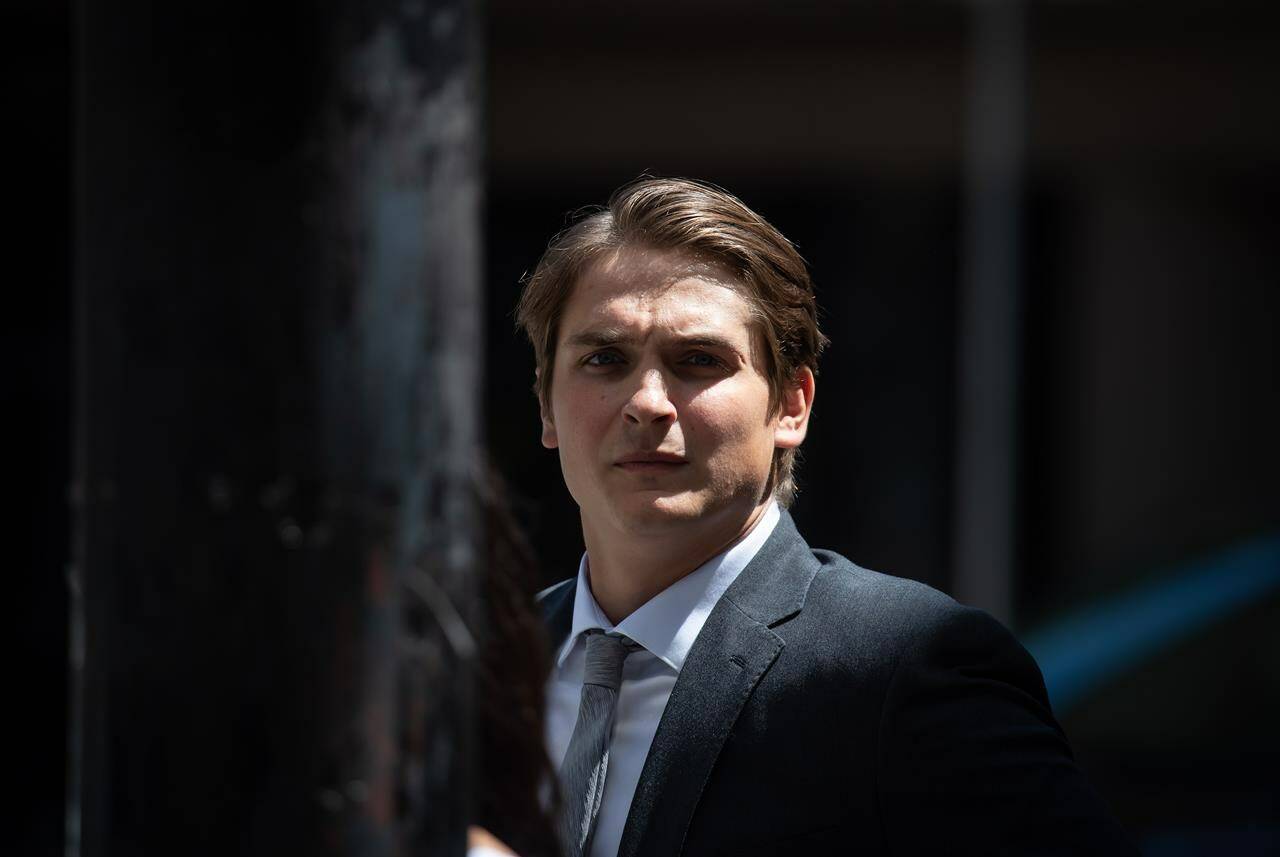 Former Vancouver Canucks NHL hockey player Jake Virtanen leaves B.C. Supreme Court during a lunch break after closing arguments in his sexual assault trial, in Vancouver, on Monday, July 25, 2022. THE CANADIAN PRESS/Darryl Dyck