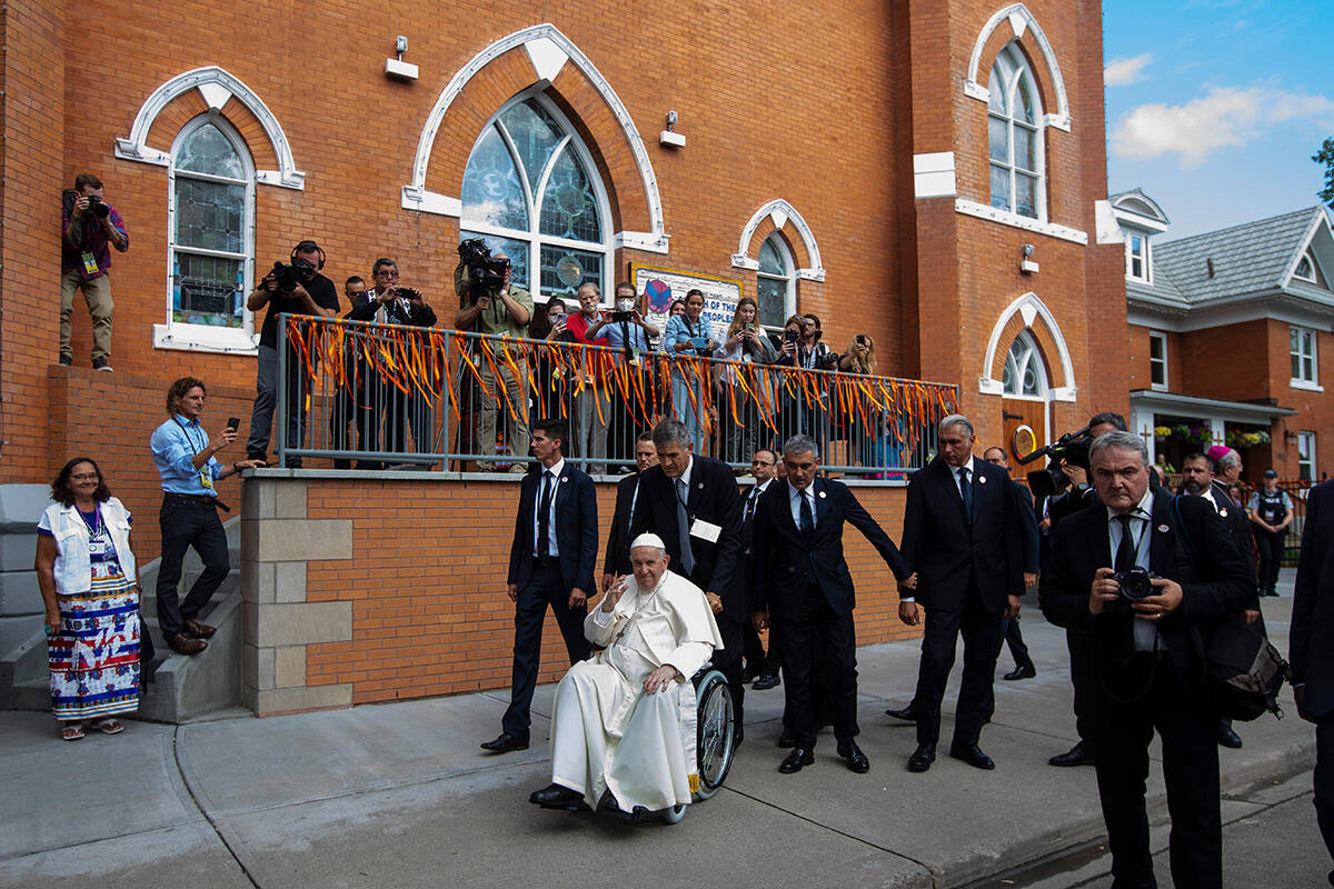Pope Francis waves as he leaves the Sacred Heart Church of the First People, in Edmonton, during his Papal visit across Canada on Monday July 25, 2022. Pope Francis apologized to the Indigenous communities for the Roman Catholic Church’s role in the residential school system. THE CANADIAN PRESS/Jason Franson