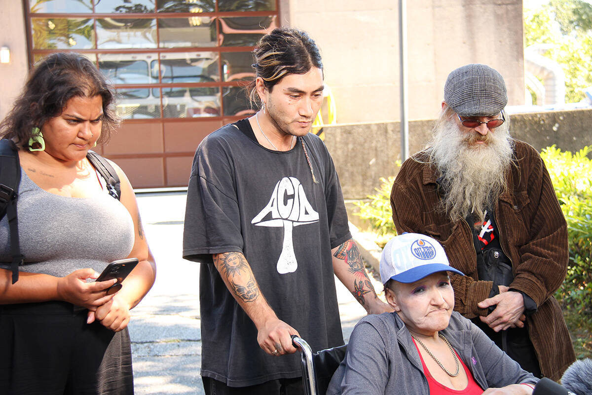 Downtown Eastside community members and advocates showed up to a media briefing at the Vancouver fire station Tuesday (July 26) to confront officials about an order to remove tents from a section of East Hastings Street. Left to right: Pivot Legal Society campaigner Meenakshi Mannoe, Vancouver Area Network of Drug User’s member Eli Oda Sheiner, East Hastings Street resident Blue, Vancouver Area Network of Drug User’s board member Dave Hamm. (Jane Skrypnek/Black Press Media)