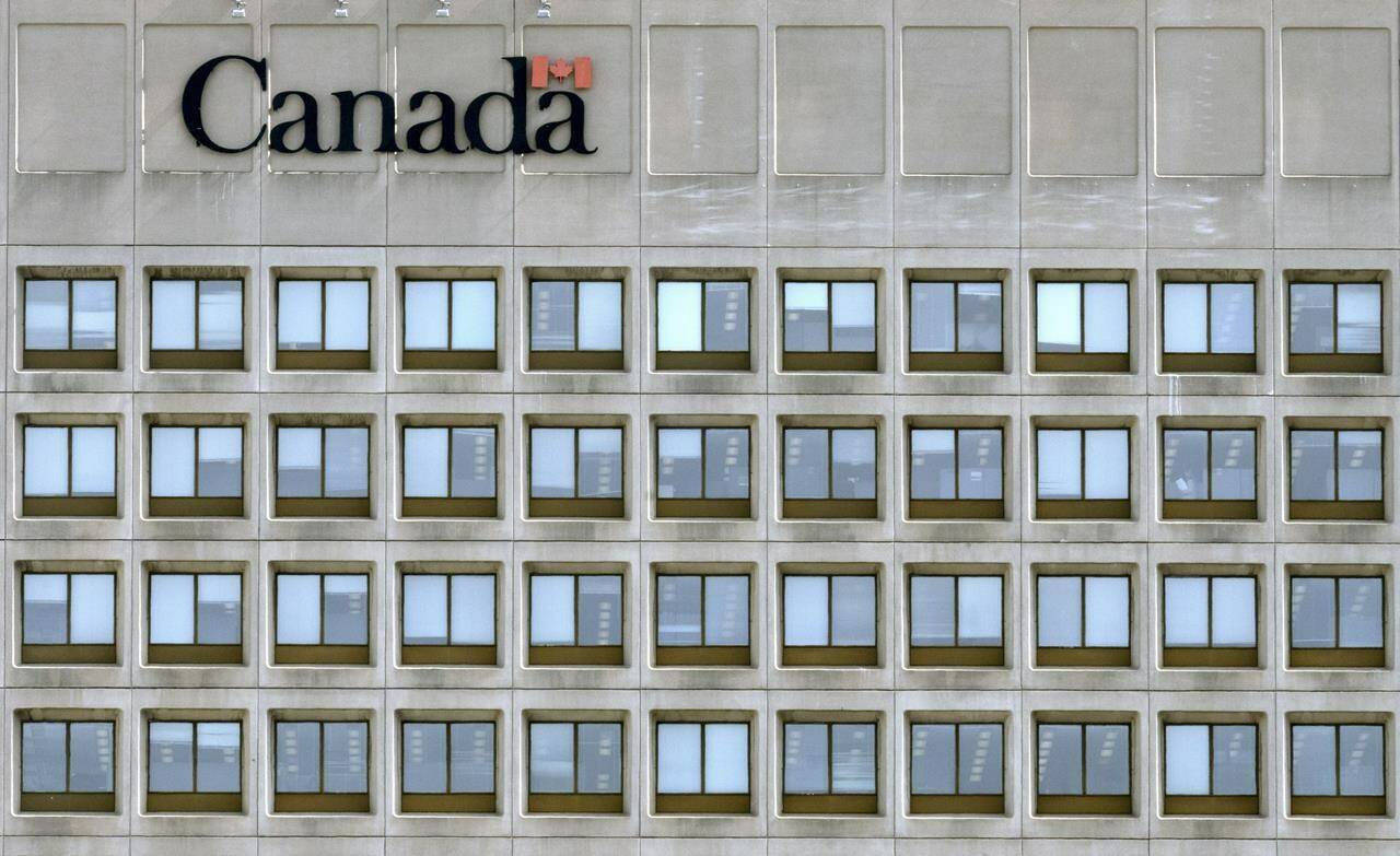 A National Defence building is seen on March 30, 2022 in Ottawa. Federal public service unions are calling out the government’s plan to return public servants to the workplace as confusing, disjointed and jeopardizing the health and safety of employees. THE CANADIAN PRESS/Adrian Wyld