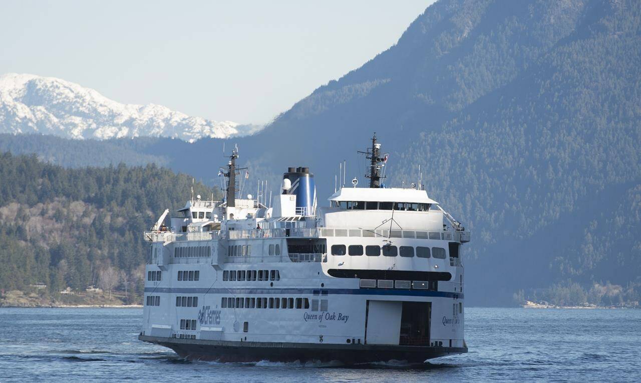 A ferry arrives at Horseshoe Bay near West Vancouver, B.C. Monday, March 16, 2020. British Columbia’s health and safety agency for workers has imposed a hefty fine on BC Ferry Services Inc. over the death of one of its workers in June 2020.THE CANADIAN PRESS/Jonathan Hayward
