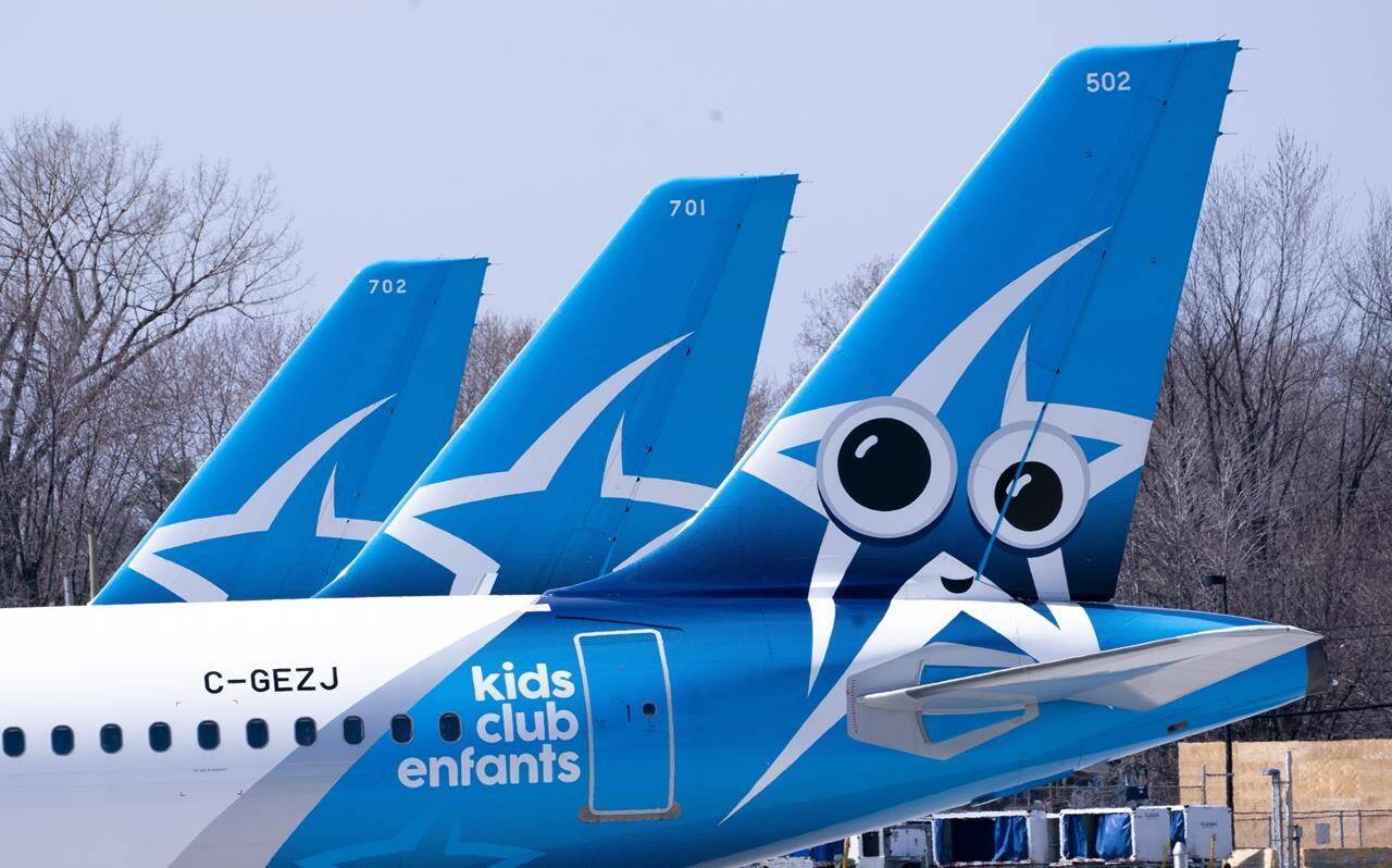 Transat AT Inc. has secured another emergency loan from Ottawa as the tour operator struggles to shore up its balance sheet. Air Transat aircraft are seen on the tarmac at Montreal-Trudeau International Airport in Montreal, on April 8, 2020. THE CANADIAN PRESS/Paul Chiasson