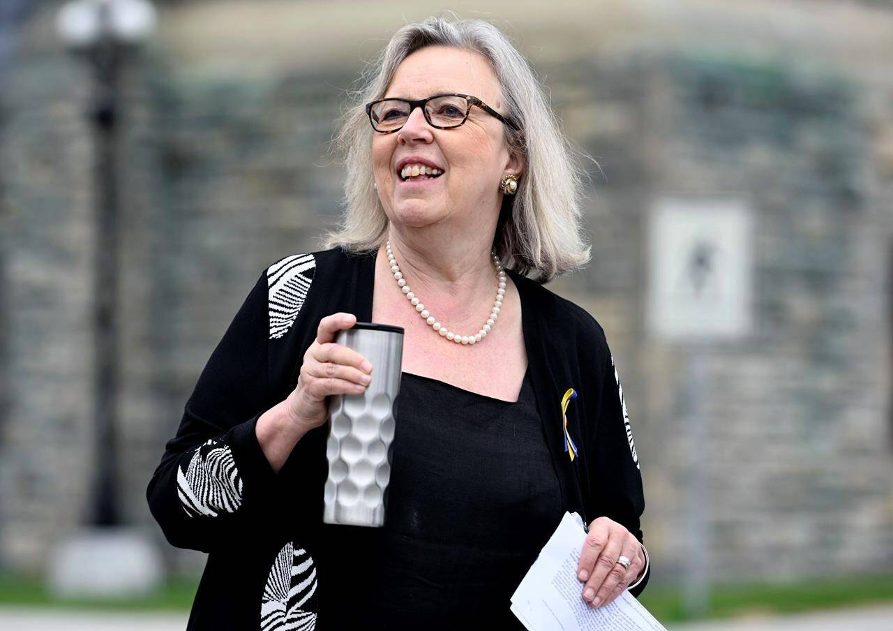 Green Party MP Elizabeth May looks on before the start of a news conference on Parliament Hill in Ottawa, on June 21, 2022. THE CANADIAN PRESS/Justin Tang