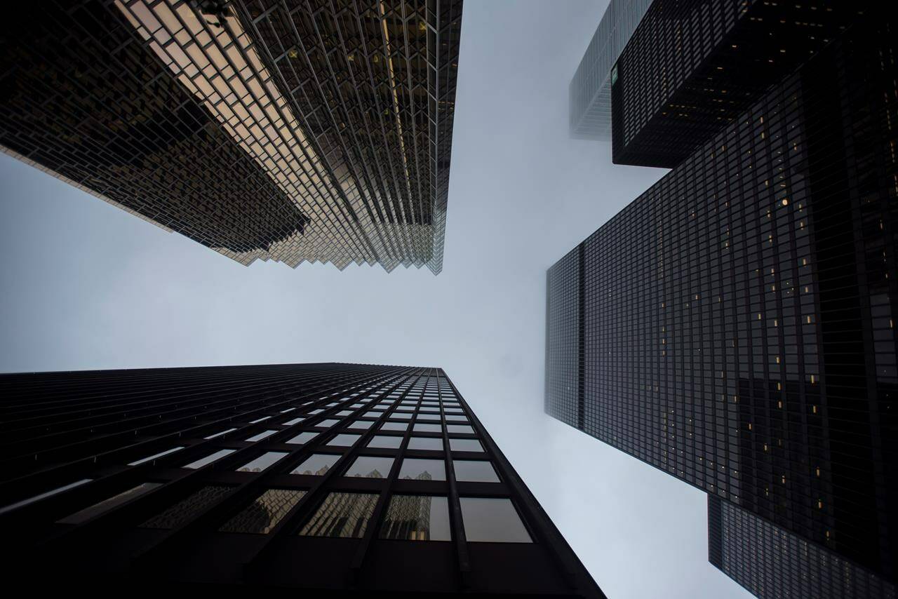 Bank buildings are photographed in Toronto’s financial district on June 27, 2018. As inflation tops eight per cent, anyone with money in the bank is seeing their savings drip away at the fastest rate on record because deposit interest rates, still largely languishing at around one per cent, haven’t kept up. THE CANADIAN PRESS/Tijana Martin