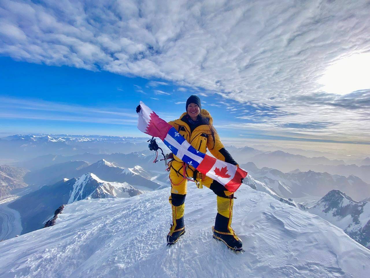 Marie-Pier Desharnais is shown atop K2 in this July 2022 handout photo. Marie-Pier Desharnais reached the top of K2 - renowned as one of the toughest mountains on earth - becoming one of the only women in Canada to summit the 8,611-metre monolith on the China-Pakistan border. THE CANADIAN PRESS/HO - Marie-Pier Desharnais