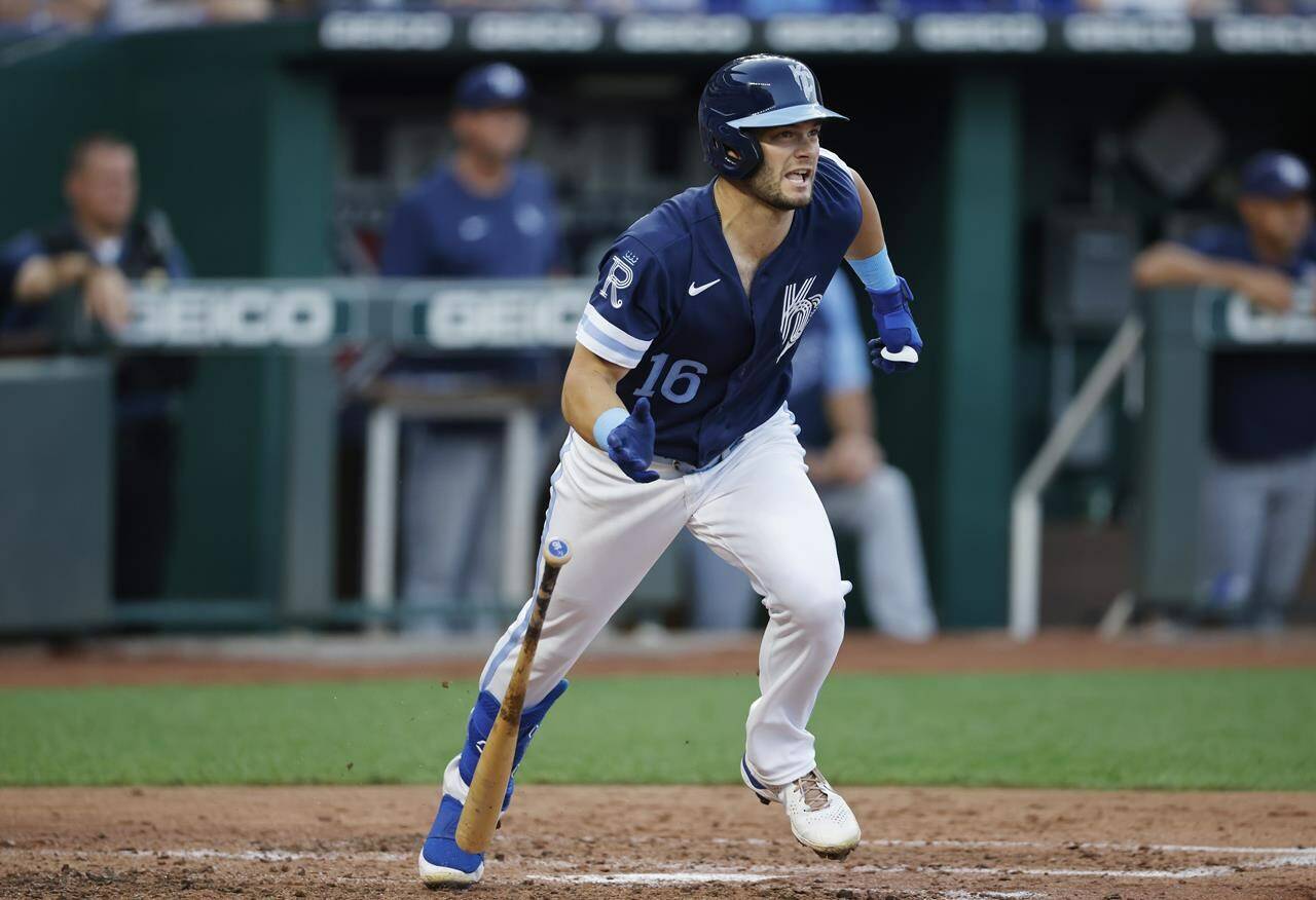 Kansas City Royals’ Andrew Benintendi leaves the batter’s box on an RBI single during the third inning of the team’s baseball game against the Tampa Bay Rays in Kansas City, Mo., Friday, July 22, 2022. (AP Photo/Colin E. Braley)