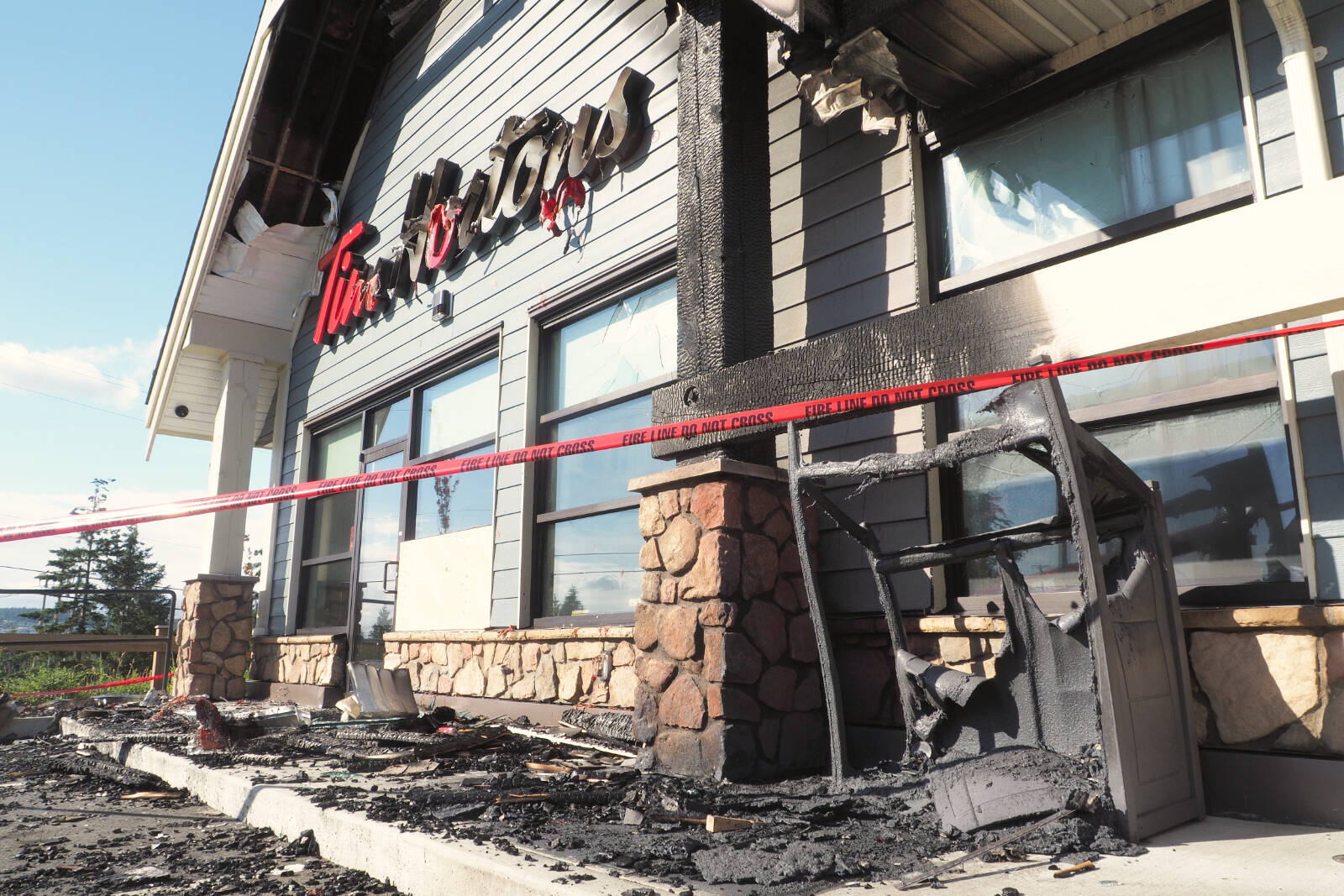 The Tim Hortons restaurant on Northfield Road in Nanaimo suffered damage in an early-morning fire Tuesday, Aug. 2. The fire is being investigated as an arson. (Chris Bush/News Bulletin)