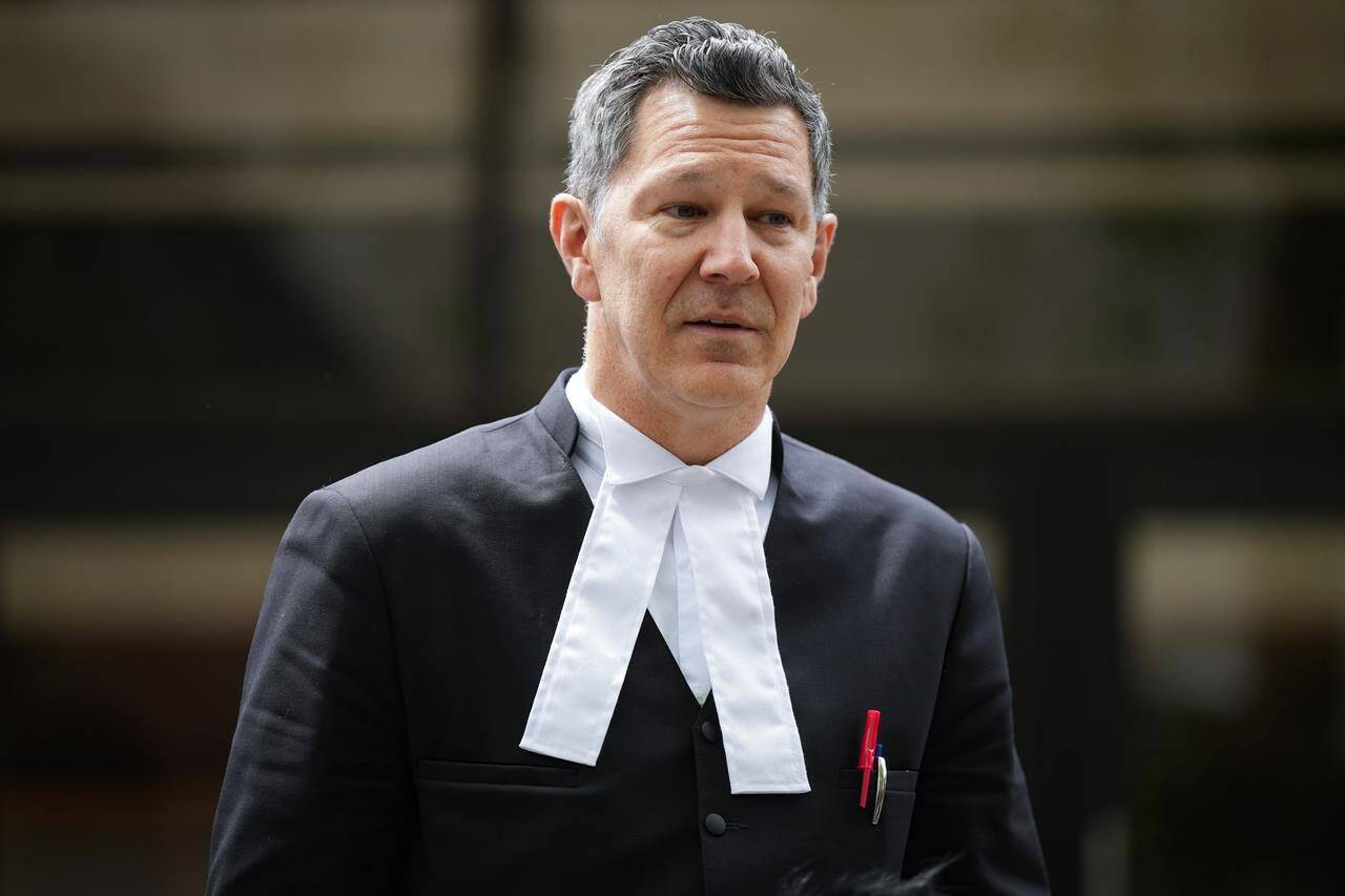 Aydin Coban’s lawyer Joe Saulnier pauses while responding to questions outside B.C. Supreme Court, in New Westminster, B.C., on Monday, June 6, 2022. The defence lawyer for the Dutch man accused of harassment and extortion of B.C. teenager Amanda Todd says sharing a link is “not child pornography.” THE CANADIAN PRESS/Darryl Dyck