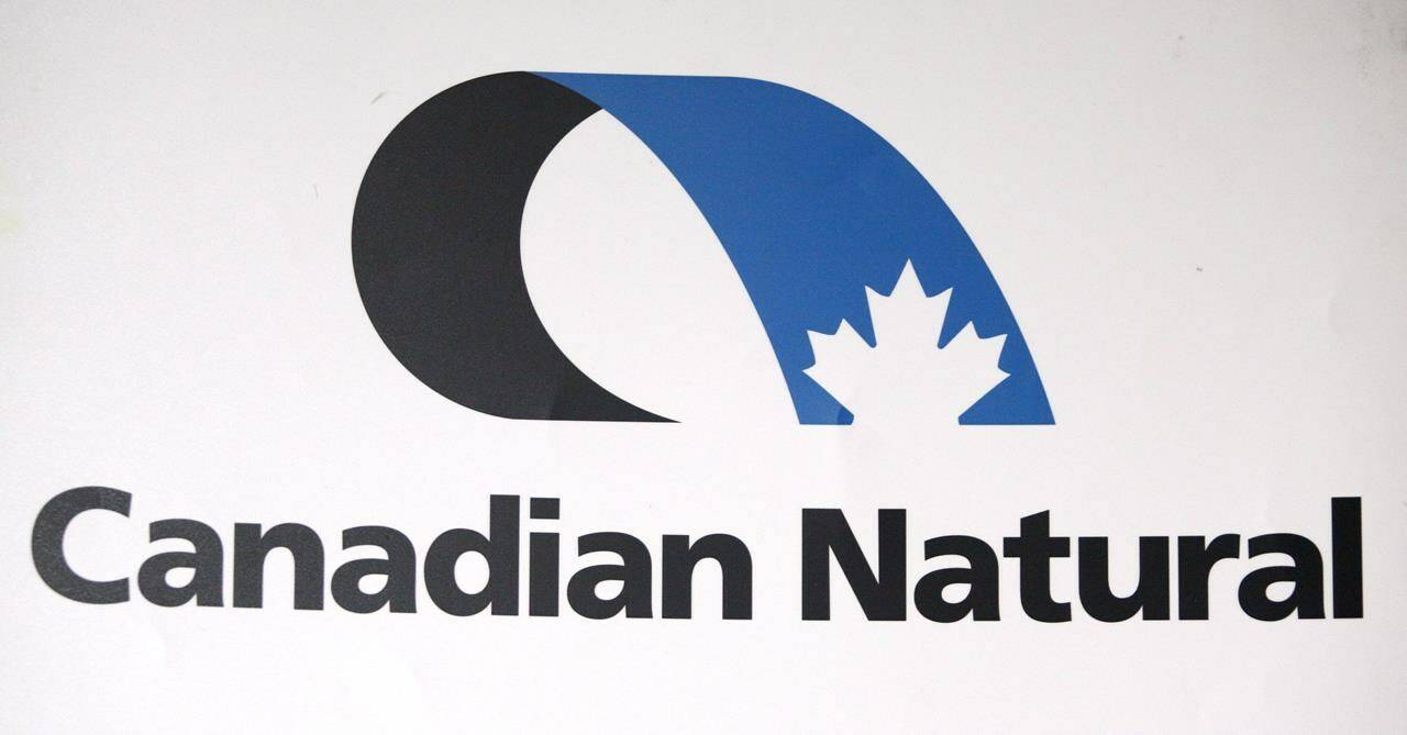 Canadian Natural Resources Ltd., logo is shown at the company’s annual meeting in Calgary on May 3, 2012. THE CANADIAN PRESS/Jeff McIntosh