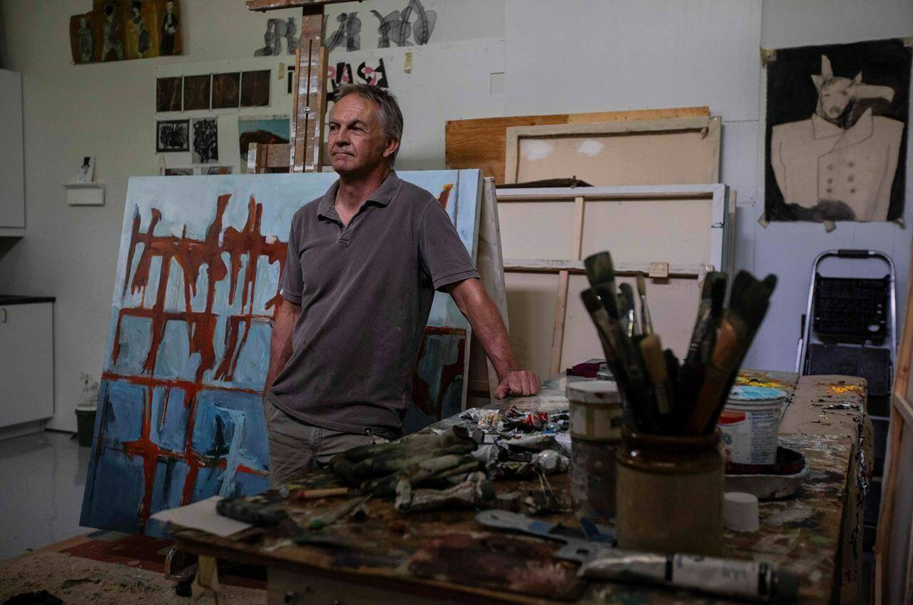Artist Paddy Lamb pictured in his studio in Edmonton, on Friday July 29, 2022. There is a proposed law change introducing a resale fee for an artist’s work. THE CANADIAN PRESS/Jason Franson