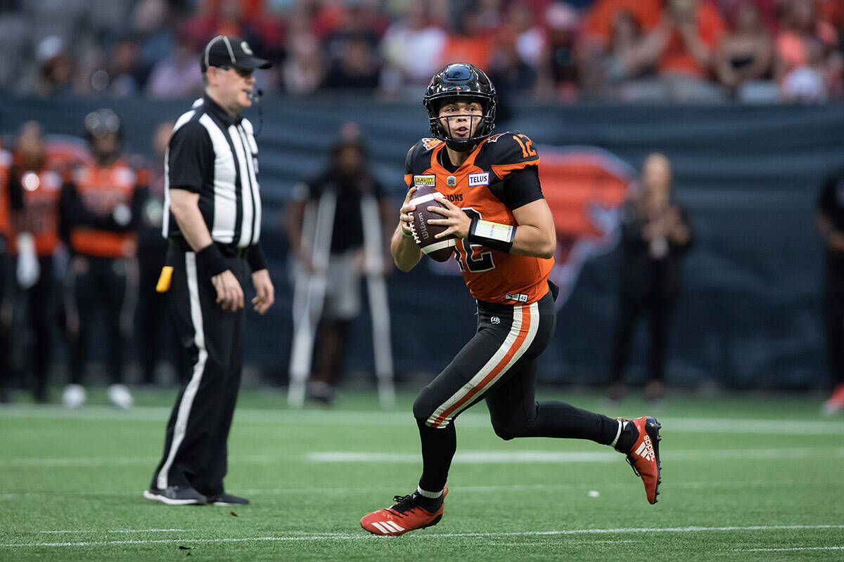 B.C. Lions quarterback Nathan Rourke looks to pass during the first half of CFL football game against the Edmonton Elks in Vancouver, on Saturday, August 6, 2022. THE CANADIAN PRESS/Darryl Dyck