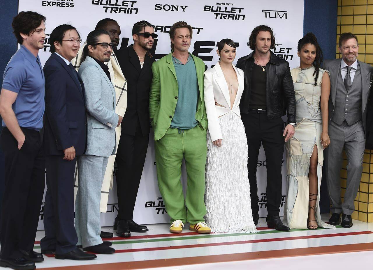 The cast of “Bullet Train” pose on the red carpet at the film’s premiere on Monday, Aug. 1, 2022, at the Regency Village Theatre in Los Angeles. Pictured from left is Logan Lerman, Masi Oka, Hiroyuki Sanada, Brian Tyree Henry, Bad Bunny, Brad Pitt, Joey King, Aaron Taylor-Johnson, Zazie Beetz and director David Leitch. (Photo by Jordan Strauss/Invision/AP)