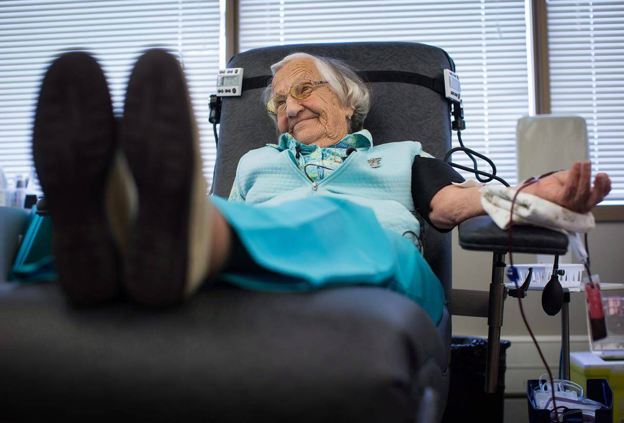 Beatrice Janyk, 95, donates blood at Canada Blood Services in Vancouver, B.C., on Wednesday April 18, 2018. Canadian Blood Services is calling on donors to book and keep appointments as it continues to face challenges in collecting blood products.THE CANADIAN PRESS/Darryl Dyck