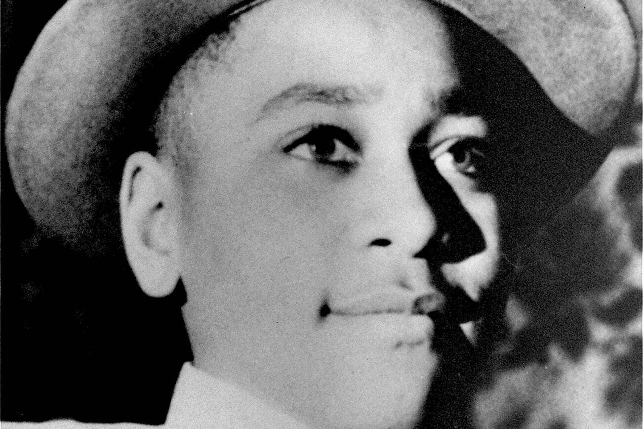 FILE - This undated portrait shows Emmett Till. The government is still investigating the brutal slaying of the black teenager that helped spur the civil rights movement more than 60 years ago. A Justice Department report issued to Congress about civil rights cold case investigations lists the 1955 slaying of 14-year-old Till as being among the unit’s active cases. Till, who was from Chicago, was abducted and beaten to death hours after he whistled at a white woman while visiting Mississippi. His body was found in a river days later. (AP Photo/File)