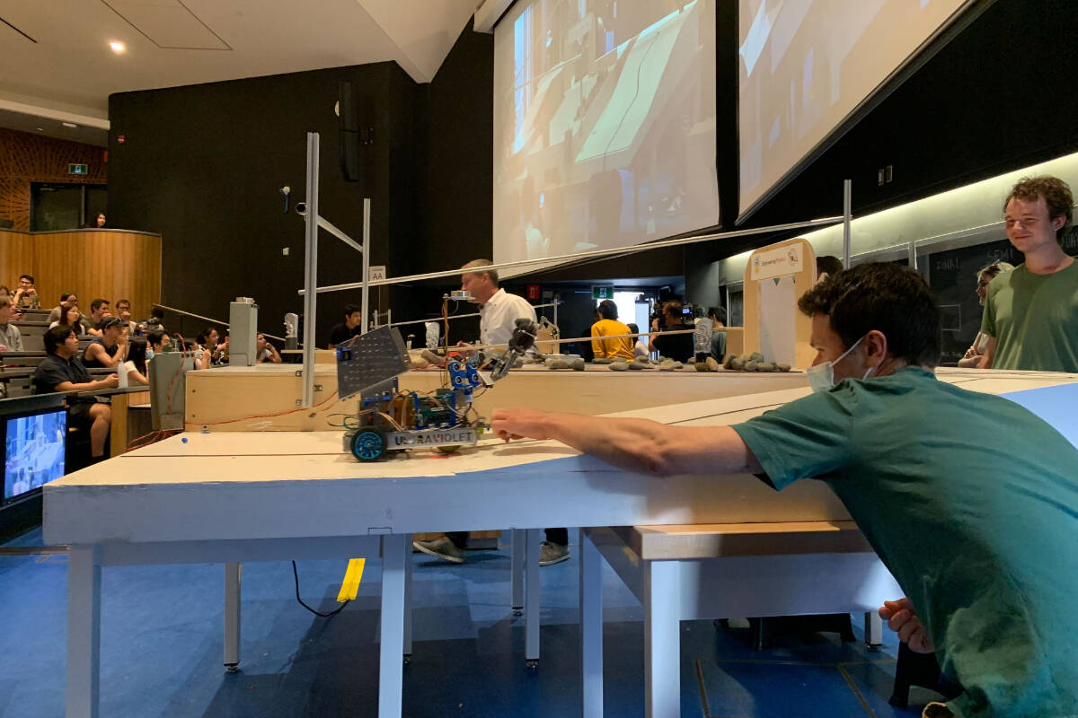 UBC students watch as the robot “Ultraviolet” navigates a complex course in the 22nd annual Treasure Robot showdown. (Kemone Moodley photo)