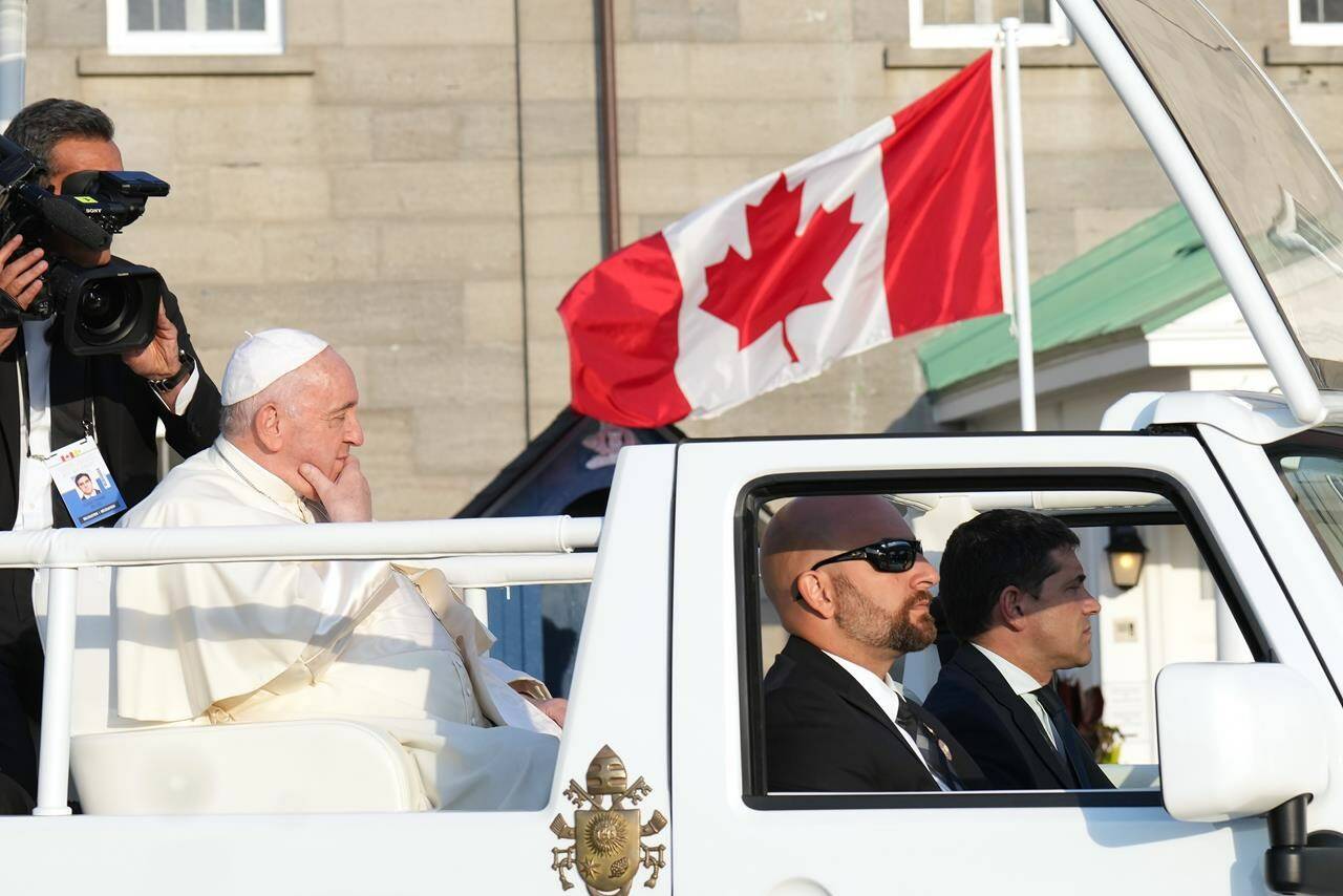 Pope Francis leaves the Citadelle in his popemobile following a reconciliation ceremony during his papal visit across Canada in Quebec City on Wednesday, July 27, 2022. THE CANADIAN PRESS/Nathan Denette