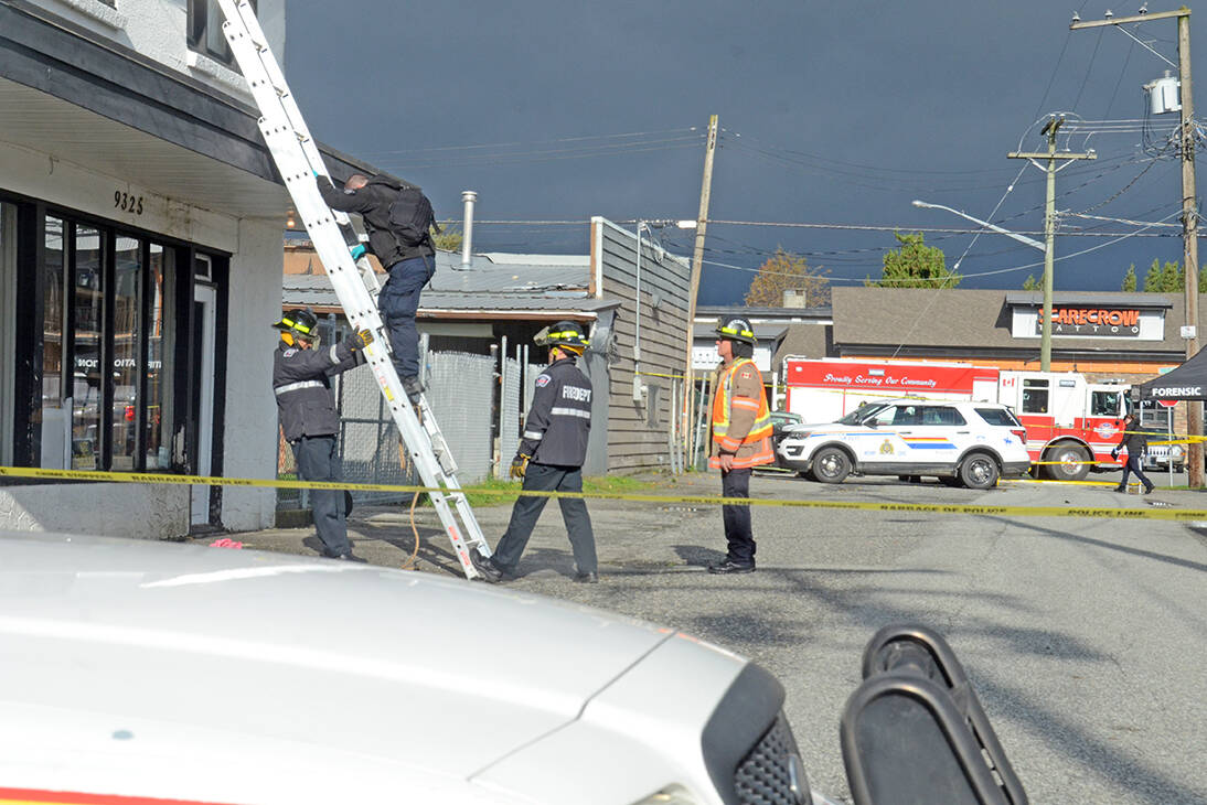 RCMP investigators examine the scene in Chilliwack on Oct. 22, 2019 after an overnight homicide at the car wash. (Paul Henderson/ The Progress)