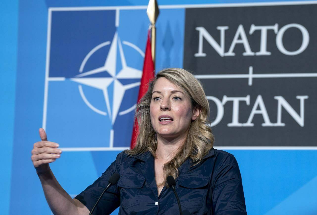 Minister for Foreign Affairs Melanie Joly responds to a question during a news conference at the NATO Summit in Madrid on June 29, 2022. The impact on Canadian jobs and global inflation were factored into Ottawa’s decision to return a turbine being repaired in Montreal to a Russian energy giant, a position paper for Ministers produced in a court case shows. THE CANADIAN PRESS/Paul Chiasson