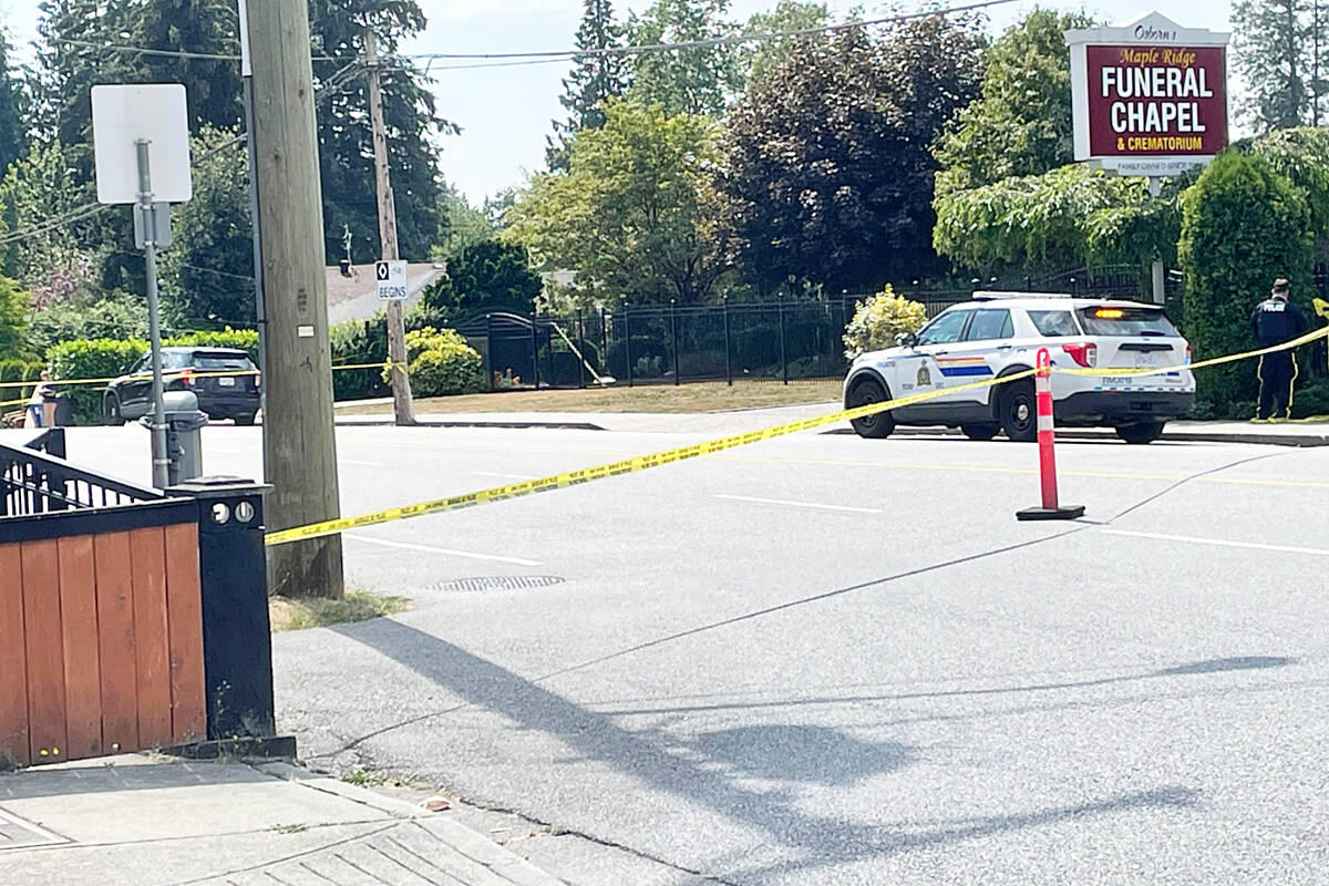 There is a heavy police presence along 216th Street in Maple Ridge for the investigation of a fatal shooting. (Brandon Tucker/The News)