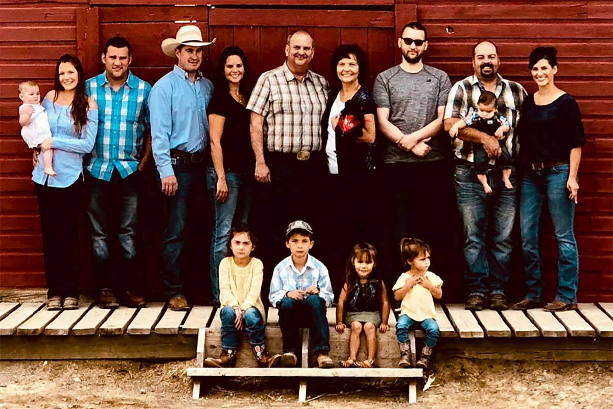 The Donaldson family of Bradner Farms has received the Century Farm Award from the provincial government. Robert Donaldson (in the centre in the plaid shirt) passed away on Aug. 11. (Photo from Bradner Farms)