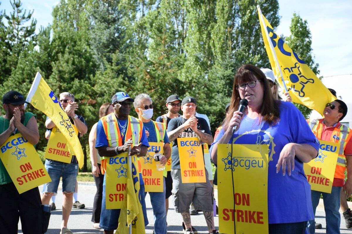 BCGEU president Stephanie Smith addresses members walking the picket line at the BC Liquor Distribution Branch’s Delta distribution centre on Monday, Aug. 15, 2022. (James Smith/North Delta Reporter).