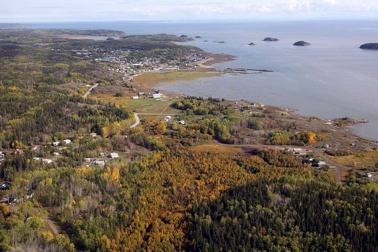 An aerial view of Fort Chipewyan, Alta., on the border of Wood Buffalo National Park is shown on Monday, Sept. 19, 2011. A United Nations body that monitors some of the world’s greatest natural glories is in Canada again to assess government responses to ongoing threats to the country’s largest national park, including plans to release treated oilsands tailings into its watershed. THE CANADIAN PRESS/Jeff McIntosh