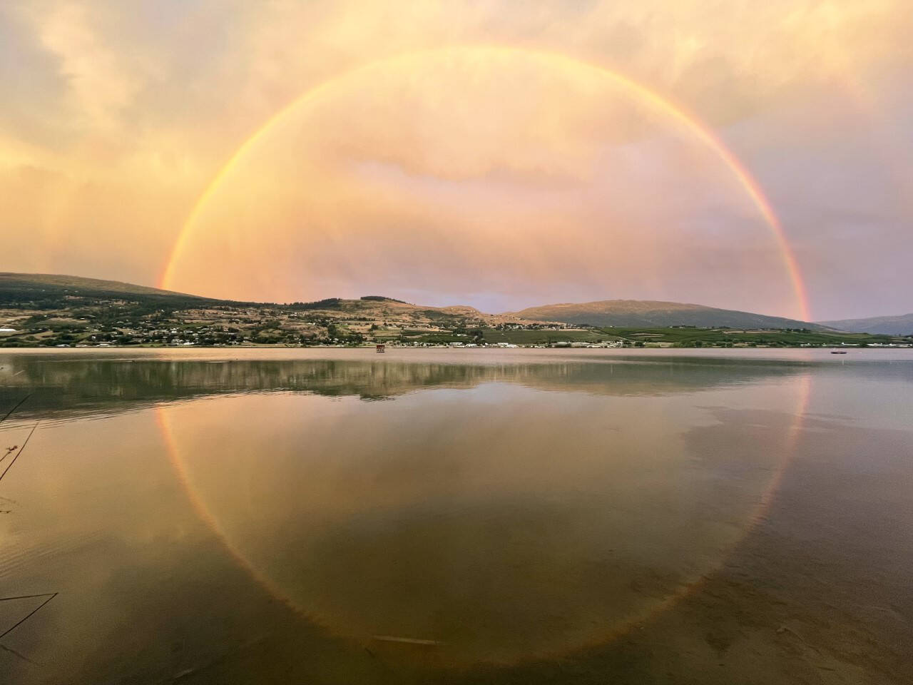 This breathtaking photo of a rainbow reflected onto a lake was taken in Vernon Friday evening, Aug. 19, 2022. (Josh Wielinga photo)