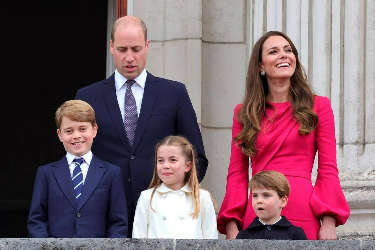 FILE - Britain’s Prince William, Kate, Duchess of Cambridge, Prince George, Princess Charlotte and Prince Louis, appear on the balcony of Buckingham Palace, during the Platinum Jubilee Pageant outside Buckingham Palace in London, June 5, 2022. Prince William and his wife, Kate, will relocate their family from central London to more rural dwellings in Windsor, and all three of their children will attend the same private school near their new home, palace officials said Monday Aug. 22, 2022. (Chris Jackson/PA via AP, File)