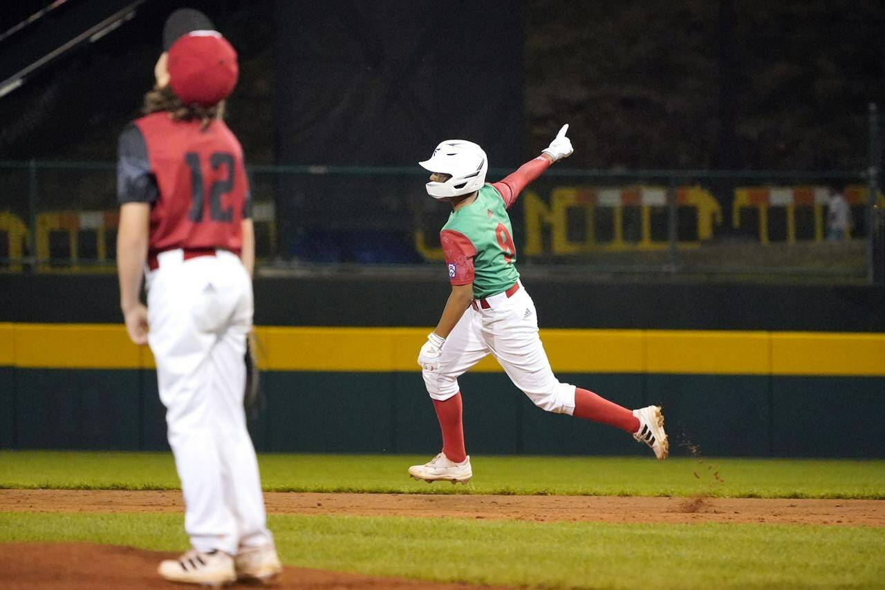 Mexico’s Miguel Padila (9) rounds the bases on his two run home run off of Canada pitcher Dylan Larter (12) during the third inning of a baseball game at the Little League World Series tournament in South Williamsport, Pa., Monday, Aug. 22, 2022. (AP Photo/Tom E. Puskar)