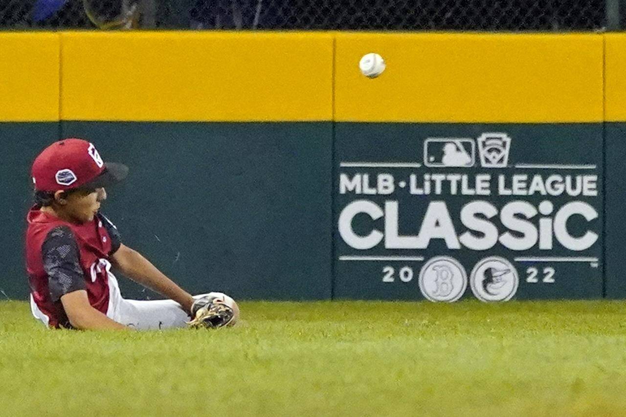 Canada left fielder Omar Bousmina and his teammates have fallen at the Little League World Series tournament in South Williamsport, Pa. (AP Photo/Tom E. Puskar)