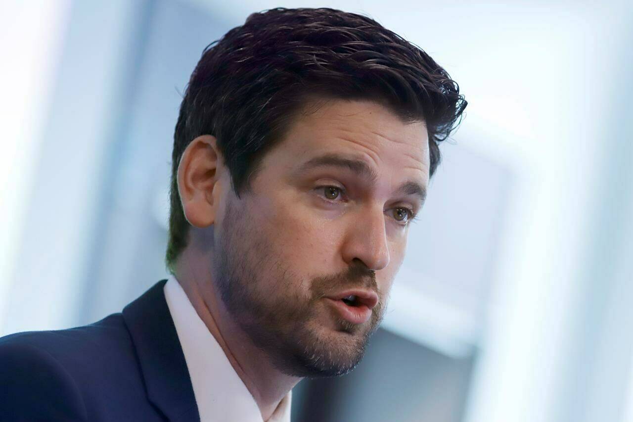 Sean Fraser speaks at an event in Ottawa on Tuesday, June 7, 2022. The immigration minister says his department is going on a hiring blitz to bring 1,250 new employees on board to tackle massive backlogs in processing applications.THE CANADIAN PRESS/ Patrick Doyle