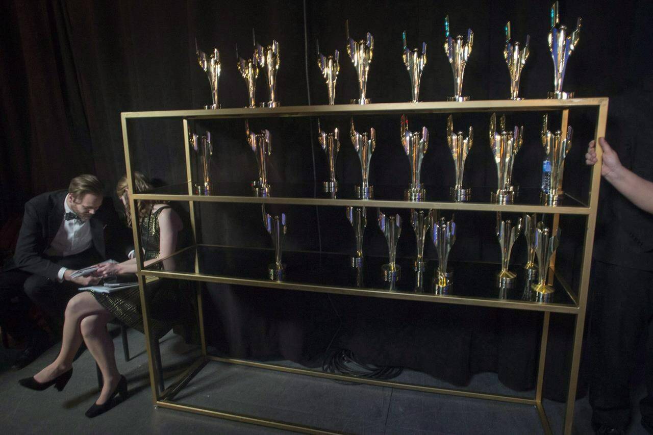 Organizers say next year’s Canadian Screen Awards will drop categories for male and female performers in favour of unspecified acting categories “to better represent the country’s diverse community of talent.” A rack of trophies are seen backstage at the 2017 Canadian Screen Awards in Toronto on Sunday, March 12, 2017. THE CANADIAN PRESS/Chris Young